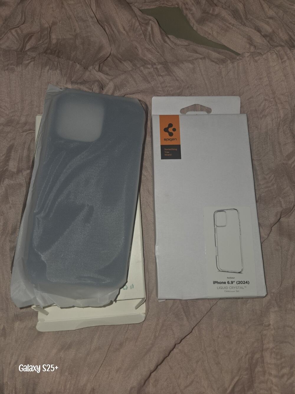Spigen Liquid Crystal Clear Case for Apple and black case. iphone 6.9 in (2024)